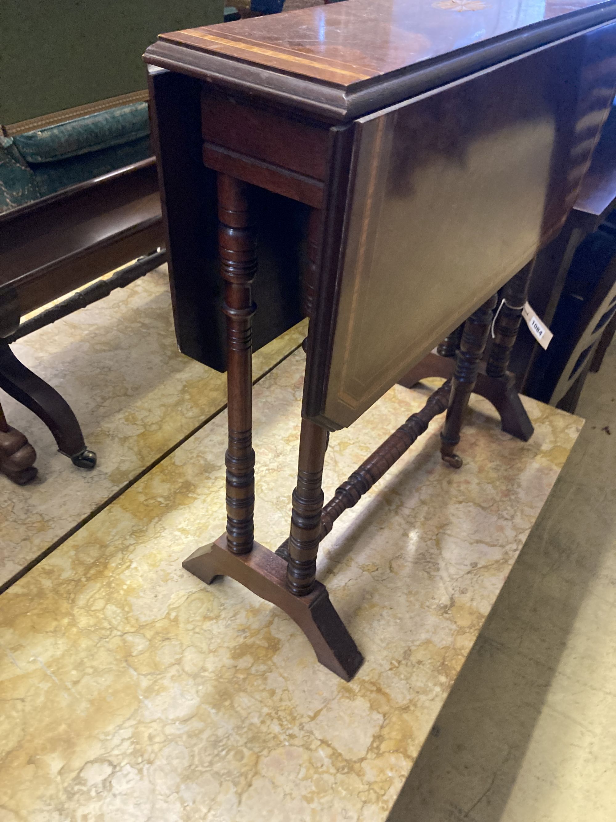 An Edwardian inlaid mahogany Sutherland table, width 60cm, depth 16cm, height 61cm